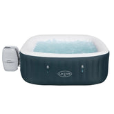 Inflatable hot tub with water and bubbles on a white background, featuring the Lay-Z-Spa brand.