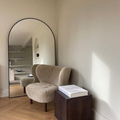 Large arched mirrors add an artistic touch to your home.