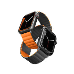 سوار Uniq Revix المغناطيسي القابل للعكس لساعة Apple Watch، مقاس 42/44/45 مم، باللون الفحمي (رمادي/برتقالي)