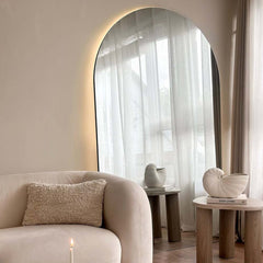 Large arched mirrors with LED add an artistic touch to your home.