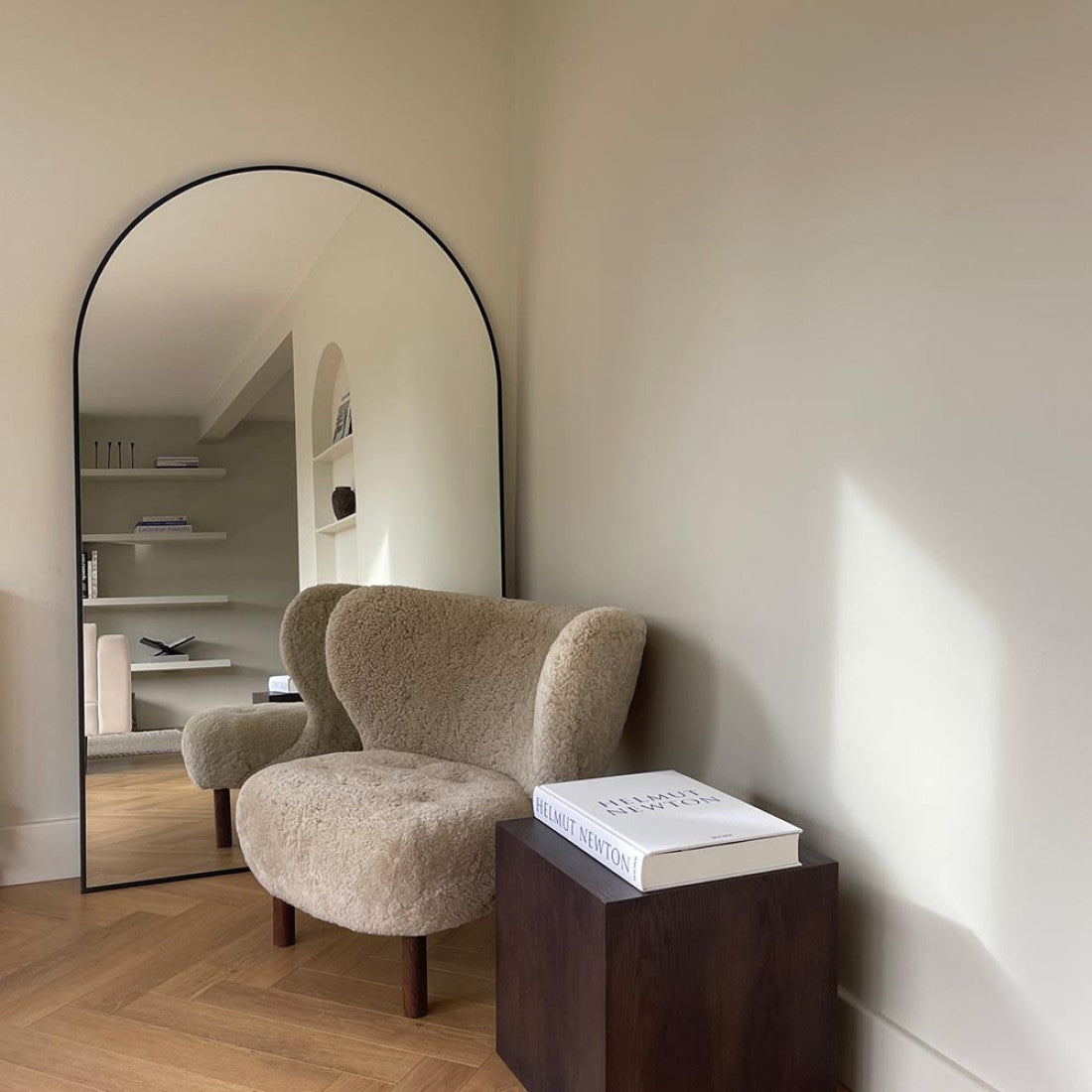 Large arched mirrors add an artistic touch to your home.